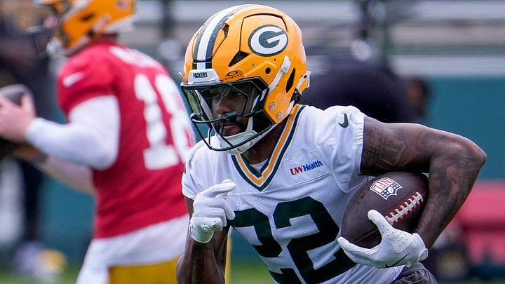 Green Bay Packers running back Pierre Strong Jr. runs with the ball during OTAs.
