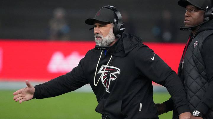 Nov 9, 2025; Berlin, Germany; Atlanta Falcons defensive coordinator Jeff Ulbrich (left) and head coach Raheem Morris in the second half against the Atlanta Falcons during the NFL Berlin Game at Olympic Stadium. Mandatory Credit: Kirby Lee-Imagn Images