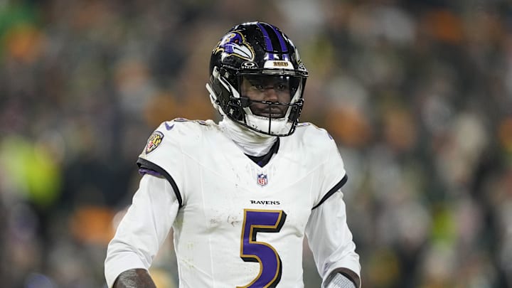 Dec 27, 2025; Green Bay, Wisconsin, USA;  Baltimore Ravens quarterback Tyler Huntley (5) during the game against the Green Bay Packers at Lambeau Field. Mandatory Credit: Jeff Hanisch-Imagn Images