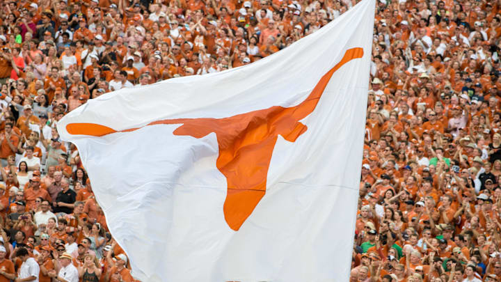 Sep 4, 2016; Austin, TX, USA; The Texas Longhorns logo flag flies during the game between the Texas Longhorns and the Notre Dame Fighting Irish at Darrell K. Royal-Texas Memorial Stadium. Texas won 50-47 in double overtime.