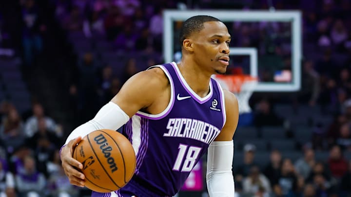 Dec 21, 2025; Sacramento, California, USA; Sacramento Kings guard Russell Westbrook (18) dribbles the ball during the first quarter against the Houston Rockets at Golden 1 Center.