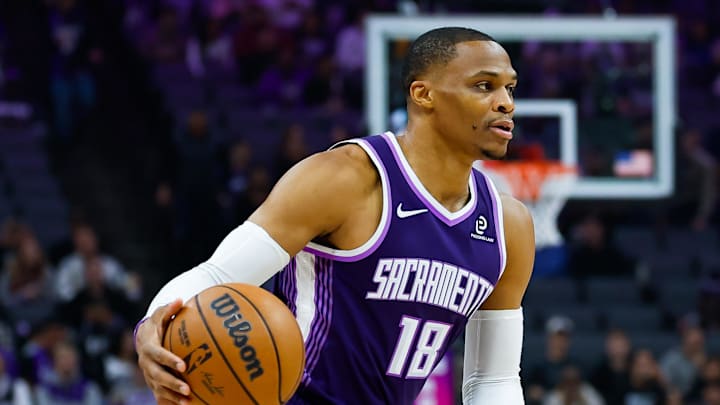 Dec 21, 2025; Sacramento, California, USA; Sacramento Kings guard Russell Westbrook (18) dribbles the ball during the first quarter against the Houston Rockets at Golden 1 Center.