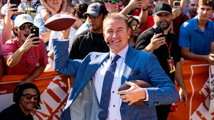 Kirk Herbstreit plays catch with a fan during Pat McAfee’s “Kicking is Easy” Contest at ESPN’s College GameDay Kirk Herbstreit plays catch with a fan during Pat McAfee’s “Kicking is Easy” Contest at ESPN’s College GameDay
