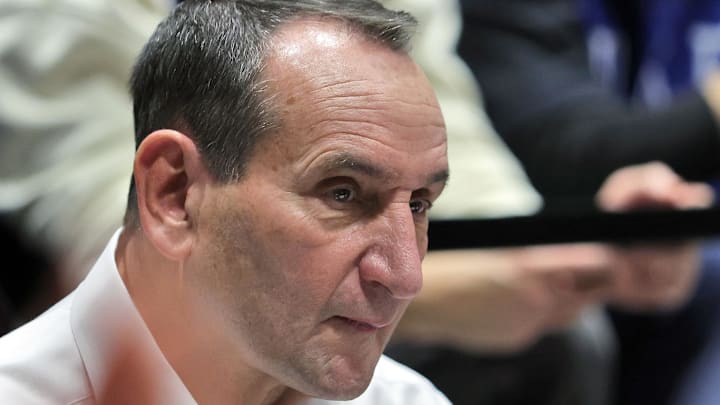 Nov 11, 2025; West Point, New York, USA; Former Duke Blue Devils and Army head coach Mike Krzyzewski watches a game between the Army Black Knights and Duke Blue Devils at Christl Arena. Mandatory Credit: Danny Wild-Imagn Images