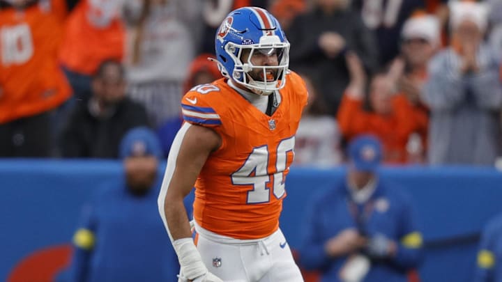 Jan 4, 2026; Denver, Colorado, USA; Denver Broncos linebacker Justin Strnad (40) celebrates after a sack during the second half against the Los Angeles Chargers at Empower Field at Mile High. 