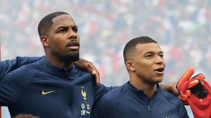 Mike Maignan und Kylian Mbappe