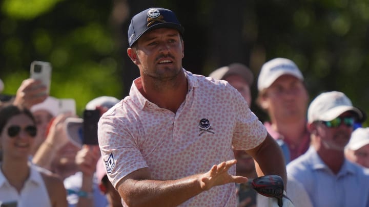 Former SMU golfer Bryson DeChambeau reacts after hitting from the number eight tee box during the third round of the U.S. Open golf tournament.