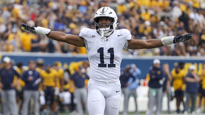Aug 31, 2024; Morgantown, West Virginia, USA; Penn State Nittany Lions defensive end Abdul Carter (11) celebrates after a defensive stop during the fourth quarter against the West Virginia Mountaineers at Mountaineer Field at Milan Puskar Stadium. Mandatory Credit: Ben Queen-Imagn Images