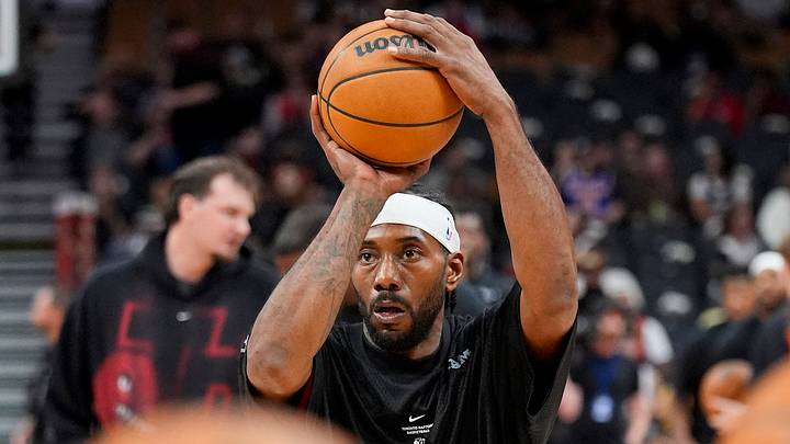 Oct 13, 2026; Toronto, Ontario, CAN;  Toronto Raptors forward Kawhi Leonard (2) shoots during warm up before a game against the New York Knicks at Scotiabank Arena.  Mandatory Credit: John E. Sokolowski-Imagn Images