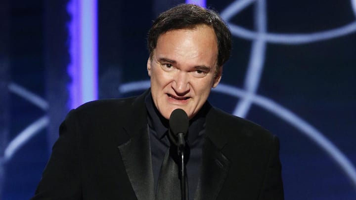 Jan 5, 2020; Beverly Hills, CA, USA; Quentin Tarantino accepts the award for Best Screenplay - Motion Picture for \"Once Upon A Time... In Hollywood\" during the 77th Annual Golden Globe Awards at The Beverly Hilton Hotel. Mandatory Credit: Paul Drinkwater/NBC Handout Photo via USA TODAY NETWORK