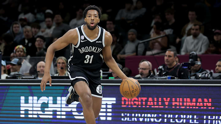 Mar 9, 2026; Brooklyn, New York, USA; Brooklyn Nets forward Chaney Johnson (31) brings the ball up court against the Memphis Grizzlies during the fourth quarter at Barclays Center. Mandatory Credit: Brad Penner-Imagn Images
