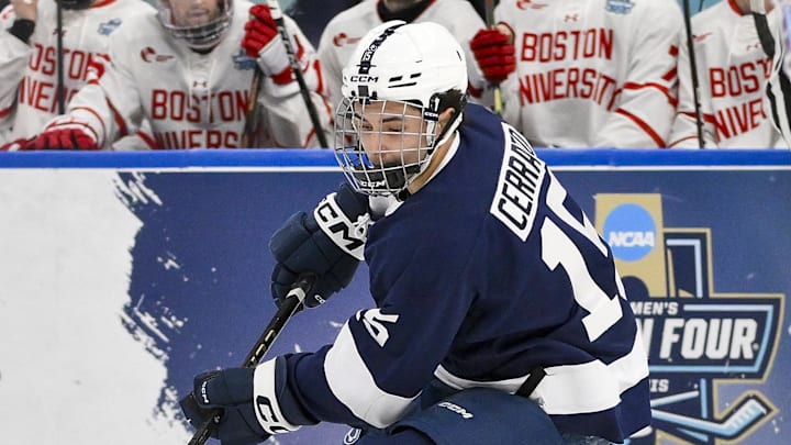 Apr 10, 2025; St. Louis, Missouri, UNITED STATES; Penn State Nittany Lions forward Charlie Cerrato (15) controls the puck against the Boston University Terriers  during the first period of the Frozen Four college ice hockey national semifinals at Enterprise Center. Mandatory Credit: Jeff Curry-Imagn Images