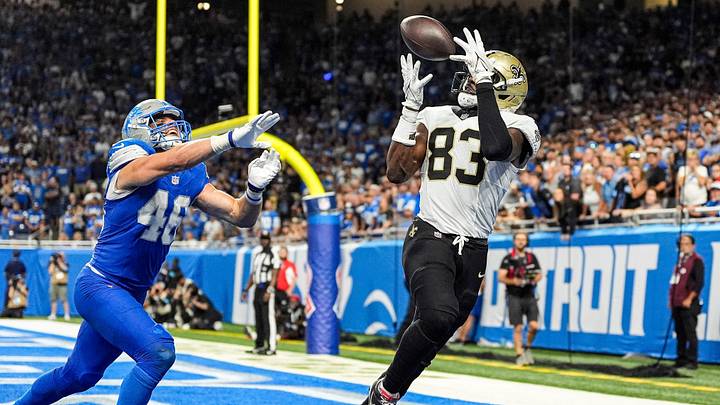 New Orleans Saints TE Juwan Johnson (83) catches for a touchdown against Detroit Lions LB Jack Campbell (46) New Orleans Saints TE Juwan Johnson (83) catches for a touchdown against Detroit Lions LB Jack Campbell (46)