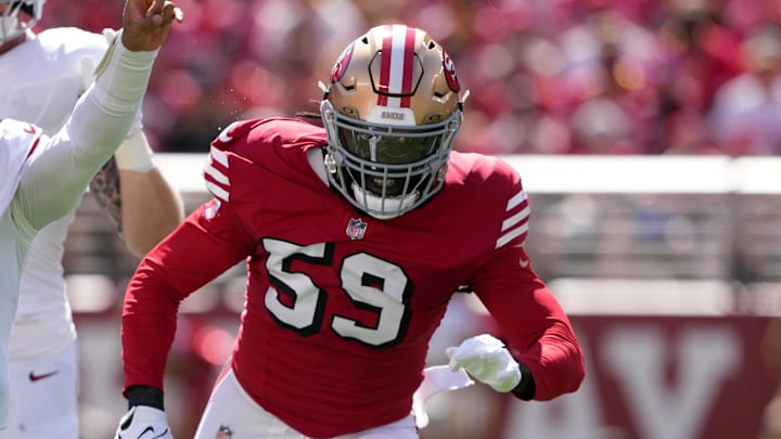 Oct 6, 2024; Santa Clara, California, USA; Arizona Cardinals quarterback Kyler Murray (1) gestures while rushing for a touchdown against the San Francisco 49ers linebacker De'Vondre Campbell (59) during the first quarter at Levi's Stadium. Mandatory Credit: Darren Yamashita-Imagn Images