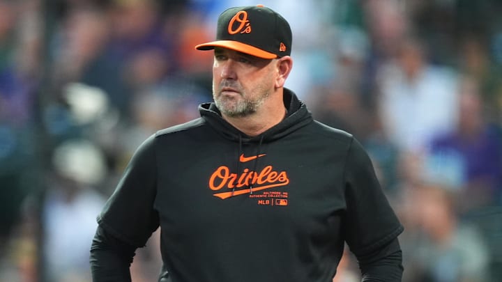 Aug 30, 2024; Denver, Colorado, USA; Baltimore Orioles manager Brandon Hyde (18) looks on during the fourth inning against the Colorado Rockies at Coors Field