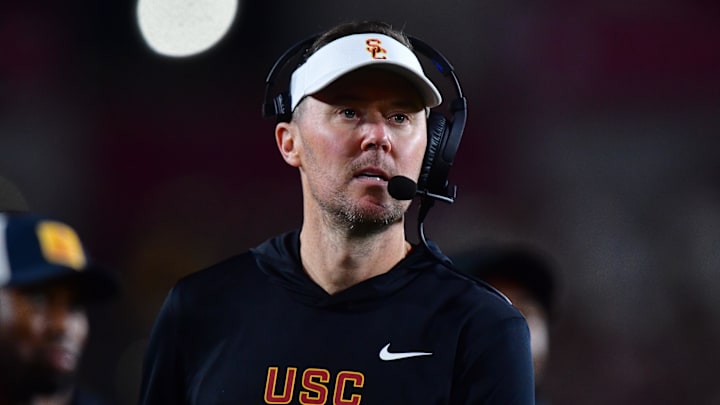 Nov 7, 2025; Los Angeles, California, USA; Southern California Trojans head coach Lincoln Riley watches game action against the Northwestern Wildcats during the second half at the Los Angeles Memorial Coliseum. Mandatory Credit: Gary A. Vasquez-Imagn Images Nov 7, 2025; Los Angeles, California, USA; Southern California Trojans head coach Lincoln Riley watches game action against the Northwestern Wildcats during the second half at the Los Angeles Memorial Coliseum. Mandatory Credit: Gary A. Vasquez-Imagn Images
