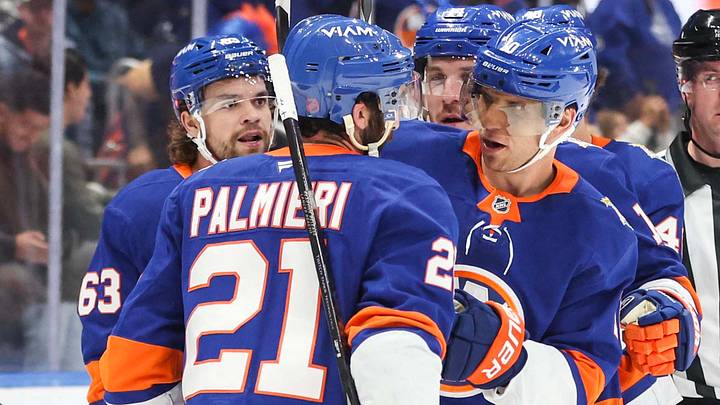 Oct 10, 2026; Elmont, New York, USA;  New York Islanders center Brayden Schenn (10) celebrates with his teammates after scoring a goal in the second period against the Tampa Bay Lightning at UBS Arena.  Mandatory Credit: Wendell Cruz-Imagn Images