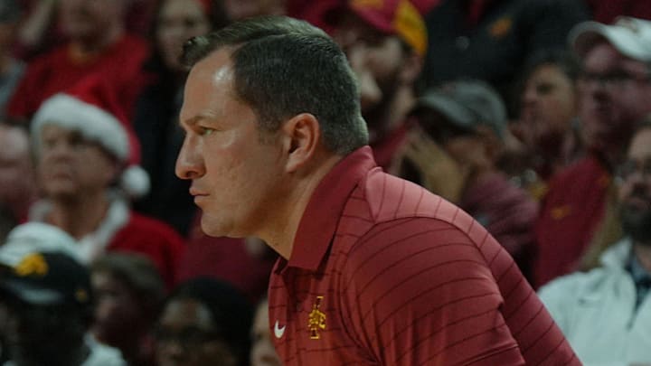 Iowa State Cyclones men's basketball head coach T.J. Otzelberger watches from bench against Iowa during the first half in the men’s basketball Cy-Hawk series on Dec. 11, 2025, in Ames, Iowa.