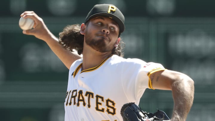 Sep 15, 2024; Pittsburgh, Pennsylvania, USA;  Pittsburgh Pirates starting pitcher Jared Jones (37) delivers a pitch against the Kansas City Royals during the first inning at PNC Park. Mandatory Credit: Charles LeClaire-Imagn Images