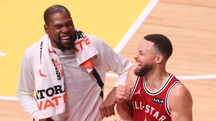 Feb 18, 2024; Indianapolis, Indiana, USA; Western Conference forward Kevin Durant (35) of the Phoenix Suns and guard Stephen Curry (30) of the Golden State Warriors react after the third quarter against the Western Conference All-Stars in the 73rd NBA All Star game at Gainbridge Fieldhouse. Mandatory Credit: Trevor Ruszkowski-Imagn Images Feb 18, 2024; Indianapolis, Indiana, USA; Western Conference forward Kevin Durant (35) of the Phoenix Suns and guard Stephen Curry (30) of the Golden State Warriors react after the third quarter against the Western Conference All-Stars in the 73rd NBA All Star game at Gainbridge Fieldhouse. Mandatory Credit: Trevor Ruszkowski-Imagn Images