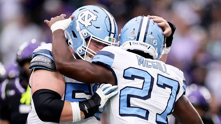 Aug 29, 2026; Dublin, Co. Dublin, IRL; North Carolina Tar Heels running back Jaylen McGill (27) celebrates with North Carolina Tar Heels defensive lineman Viliami Moala (56) after scoring a touchdown against the TCU Horned Frogs in the first half at Aviva Stadium. Mandatory Credit: Laszlo Geczo-Imagn Images Aug 29, 2026; Dublin, Co. Dublin, IRL; North Carolina Tar Heels running back Jaylen McGill (27) celebrates with North Carolina Tar Heels defensive lineman Viliami Moala (56) after scoring a touchdown against the TCU Horned Frogs in the first half at Aviva Stadium. Mandatory Credit: Laszlo Geczo-Imagn Images