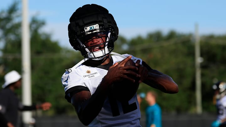 Jacksonville Jaguars wide receiver Travis Hunter (12) catches a pass during an NFL training camp session at the Miller Electric Center, Monday, Aug. 11, 2025 in Jacksonville, Fla. [Corey Perrine/Florida Times-Union]