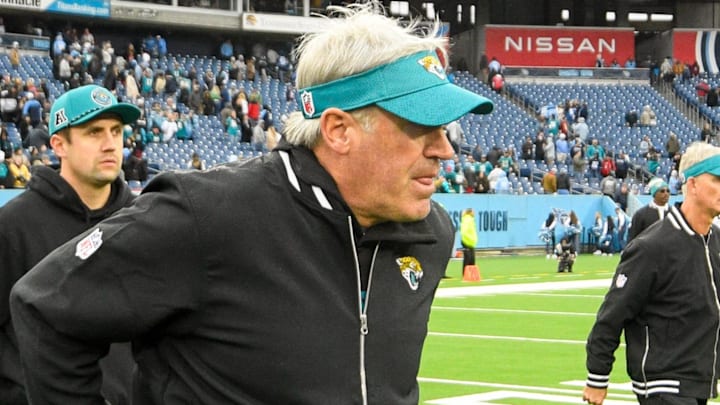 Dec 8, 2024; Nashville, Tennessee, USA;  Jacksonville Jaguars head coach Doug Pederson walks over to meet Tennessee Titans head coach Brian Callahan during the second half at Nissan Stadium. Mandatory Credit: Steve Roberts-Imagn Images