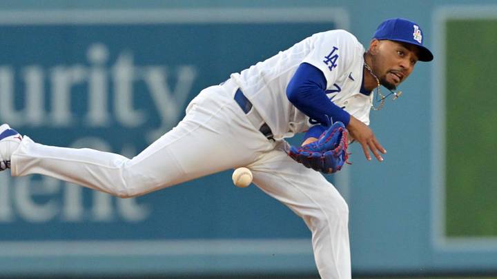 Jun 5, 2026; Los Angeles, California, USA;  Los Angeles Dodgers shortstop Mookie Betts (50) makes a play to get Los Angeles Angels second baseman Adam Frazier (20) out at second in the third inning at Dodger Stadium. Mandatory Credit: Jayne Kamin-Oncea-Imagn Images