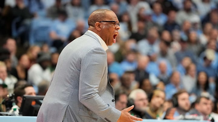 Jan 25, 2025; Chapel Hill, North Carolina, USA;  North Carolina Tar Heels head coach Hubert Davis reacts in the first half at Dean E. Smith Center. Mandatory Credit: Bob Donnan-Imagn Images
