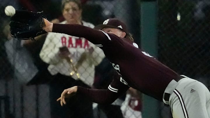 Mississippi State left fielder Gehrig Frei makes a diving catch on a line drive against Alabama earlier this season.