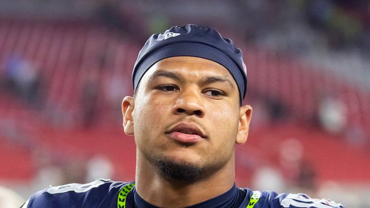 Seattle Seahawks tight end Elijah Arroyo leaves the field