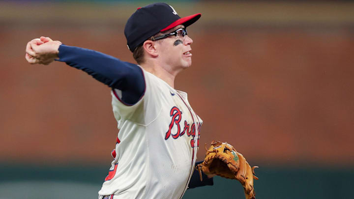 Atlanta Braves shortstop Nick Allen (2) throws a runner out at first against the Milwaukee Brewers in the sixth inning at Truist Park. 