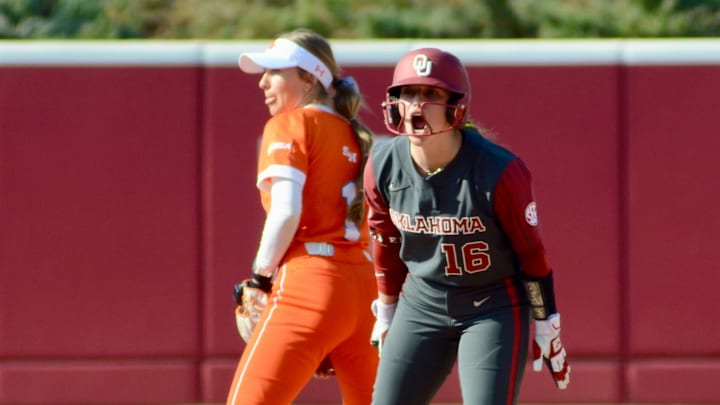 Oklahoma outfielder Abby Dayton celebrates after a base hit against Sam Houston. Oklahoma outfielder Abby Dayton celebrates after a base hit against Sam Houston.