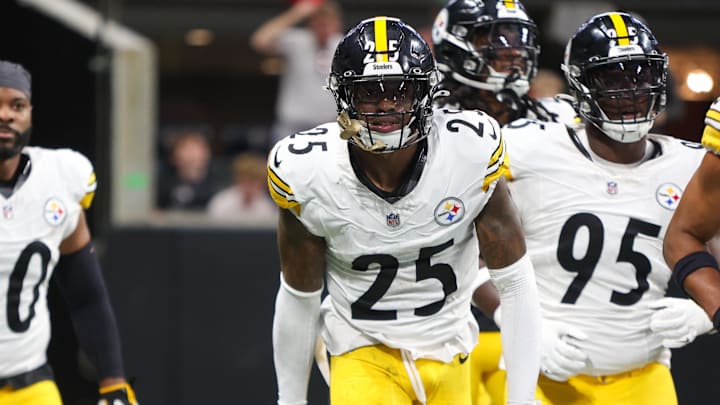 Sep 8, 2024; Atlanta, Georgia, USA; Pittsburgh Steelers safety DeShon Elliott (25) celebrates with teammates after an interception against the Atlanta Falcons in the first quarter at Mercedes-Benz Stadium. Mandatory Credit: Brett Davis-Imagn Images