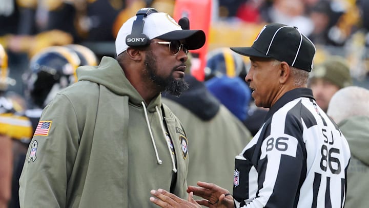 Nov 16, 2025; Pittsburgh, Pennsylvania, USA; Pittsburgh Steelers head coach Mike Tomlin talks with side judge Jimmy Buchanan (86) following a play against the Cincinnati Bengals during the second half at Acrisure Stadium. Mandatory Credit: Charles LeClaire-Imagn Images Nov 16, 2025; Pittsburgh, Pennsylvania, USA; Pittsburgh Steelers head coach Mike Tomlin talks with side judge Jimmy Buchanan (86) following a play against the Cincinnati Bengals during the second half at Acrisure Stadium. Mandatory Credit: Charles LeClaire-Imagn Images