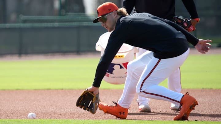 Orioles infielder Gunnar Henderson fields a ground ball during drills on Tuesday. The Baltimore Orioles held their first full-squad workout of the 2025 spring training season on Tuesday, Feb. 18th in Sarasota, Florida.