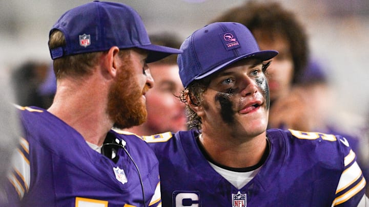 Minnesota Vikings QBs Carson Wentz (L) and J.J. McCarthy (R)