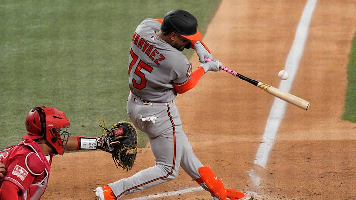 Aug 7, 2026; Arlington, Texas, USA;  Baltimore Orioles catcher Carlos Narvaez (75) hits a single against the Texas Rangers during the fourth inning at Globe Life Field. Mandatory Credit: Raymond Carlin III-Imagn Images