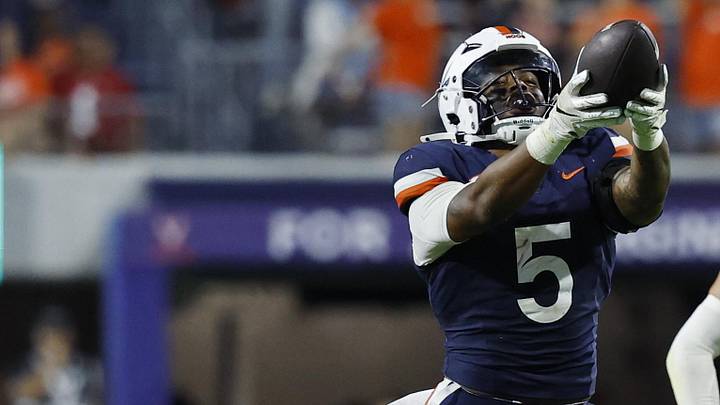 Sep 20, 2025; Charlottesville, Virginia, USA; Virginia Cavaliers linebacker Kam Robinson (5) celebrates after recovering a fumble by Stanford Cardinal quarterback Ben Gulbranson (not pictured) during the fourth quarter at Scott Stadium. Mandatory Credit: Geoff Burke-Imagn Images Sep 20, 2025; Charlottesville, Virginia, USA; Virginia Cavaliers linebacker Kam Robinson (5) celebrates after recovering a fumble by Stanford Cardinal quarterback Ben Gulbranson (not pictured) during the fourth quarter at Scott Stadium. Mandatory Credit: Geoff Burke-Imagn Images