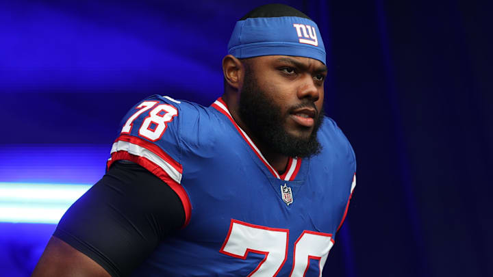 Dec 14, 2025; East Rutherford, New Jersey, USA;  New York Giants offensive tackle Andrew Thomas (78) enters the field prior to the first quarter against the Washington Commanders at MetLife Stadium.  