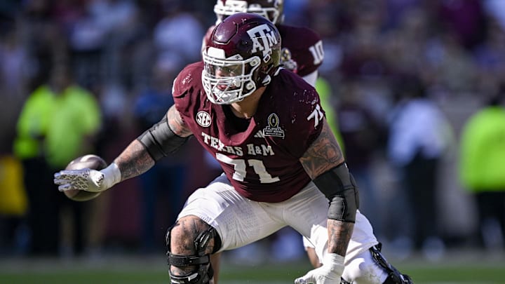 Dec 20, 2025; College Station, TX, USA; Texas A&M Aggies offensive lineman Chase Bisontis (71) blocks the rush during the game between the Aggies and the Hurricanes at Kyle Field. Mandatory Credit: Jerome Miron-Imagn Images