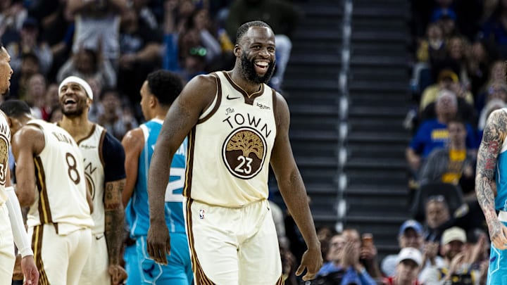 Jan 17, 2026; San Francisco, California, USA; Golden State Warriors forward Draymond Green (23) reacts after a teammate scored against the Charlotte Hornets during the third quarter at Chase Center. Mandatory Credit: John Hefti-Imagn Images