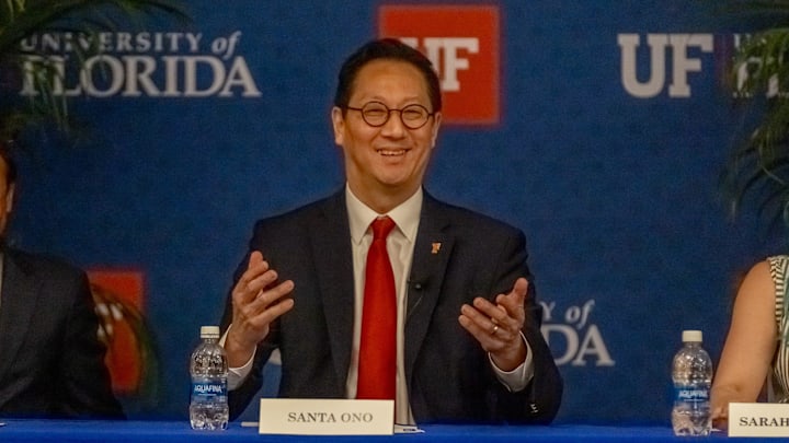 University of Florida faculty members listen to Dr. Santa Ono, center, the sole finalist for the university's president, along with Rahul Patel, left, and Sarah Lynne during a forum on May 6, 2025, at Emerson Alumni Hall in Gainesville.