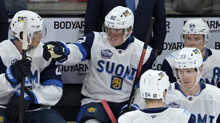 Team Finland coach Antti Pennanen behind forward Patrik Laine in the first period during the 4 Nations Face-Off vs. Team Sweden. Team Finland coach Antti Pennanen behind forward Patrik Laine in the first period during the 4 Nations Face-Off vs. Team Sweden.