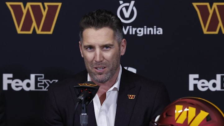 Feb 5, 2024; Ashburn, VA, USA; Washington Commanders general manager Adam Peters (R) speaks during an introductory press press conference for Commanders head coach Dan Quinn (not pictured) at Commanders Park. Mandatory Credit: Geoff Burke-Imagn Images