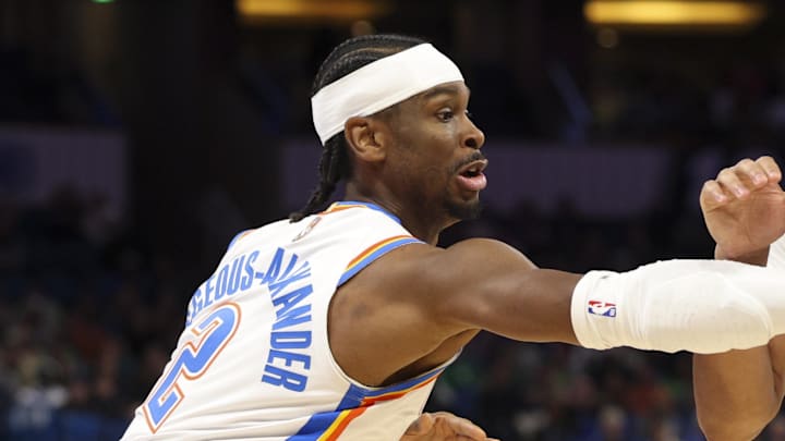 Mar 17, 2026; Orlando, Florida, USA; Oklahoma City Thunder guard Shai Gilgeous-Alexander (2) knocks the ball from Orlando Magic guard Jalen Suggs (4) in the first quarter at Kia Center. Mandatory Credit: Nathan Ray Seebeck-Imagn Images