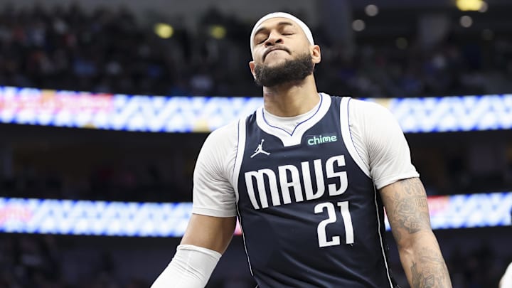 Jan 25, 2025; Dallas, Texas, USA;  Dallas Mavericks center Daniel Gafford (21) reacts during the second half against the Boston Celtics at American Airlines Center. Mandatory Credit: Kevin Jairaj-Imagn Images