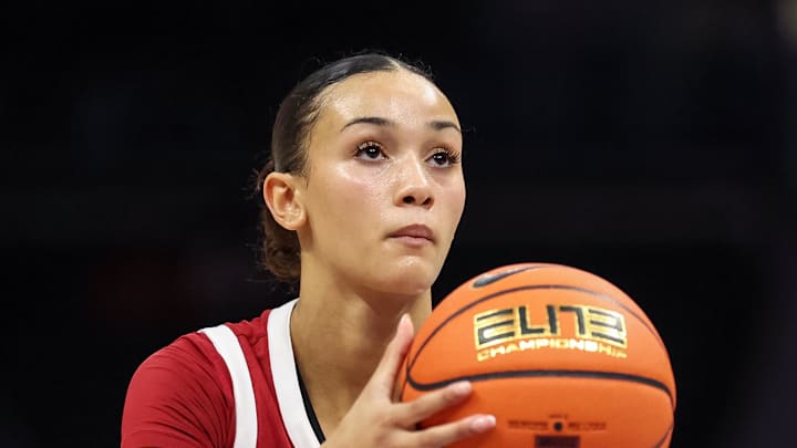 Nov 9, 2025; Charlotte, North Carolina, USA; Southern California Trojans guard Jazzy Davidson (9) makes a free throw against the NC State Wolfpack during the third quarter of the Ally Tipoff game at Spectrum Center. Mandatory Credit: Cory Knowlton-Imagn Images