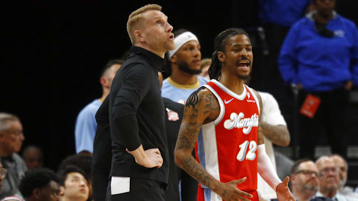 Memphis Grizzlies interim head coach Tuomas Iisalo and guard Ja Morant react after a foul call.