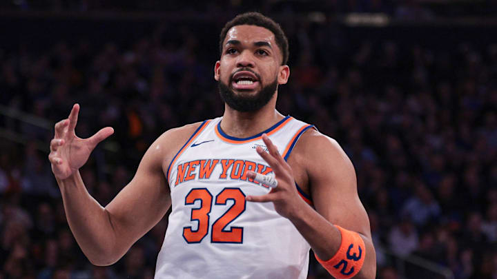 Feb 19, 2026; New York, New York, USA; New York Knicks center Karl-Anthony Towns (32) reacts during the first half against Detroit Pistons at Madison Square Garden. Mandatory Credit: Vincent Carchietta-Imagn Images